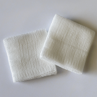 Two white gauze pads