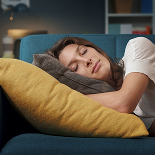 Woman sleeping on a couch