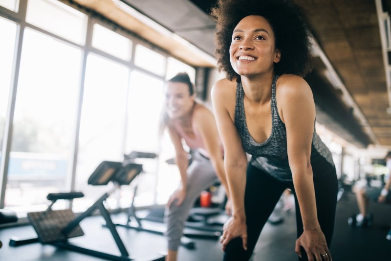 Smiling woman doing an exercise